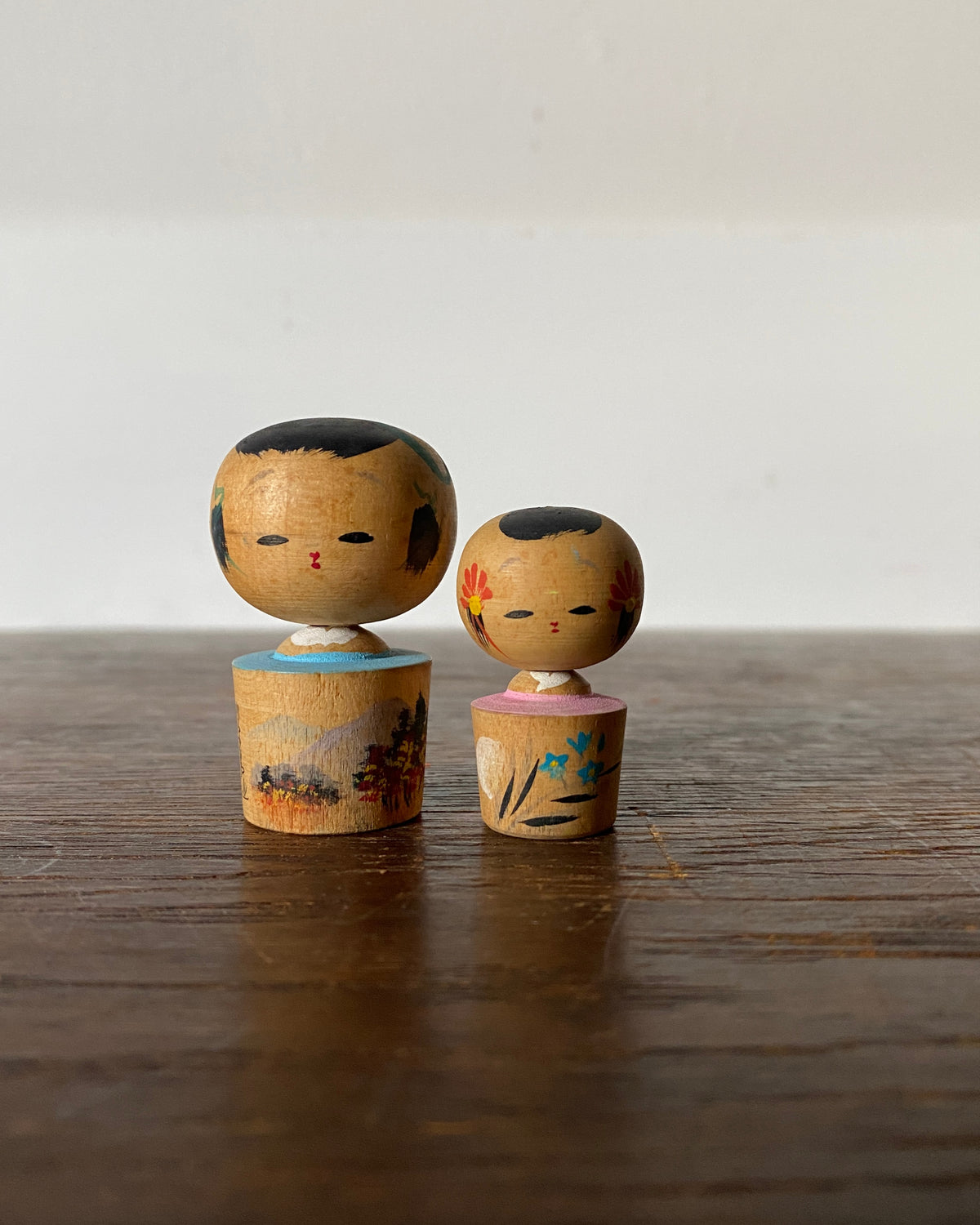 vintage floral souvenir kokeshi pair