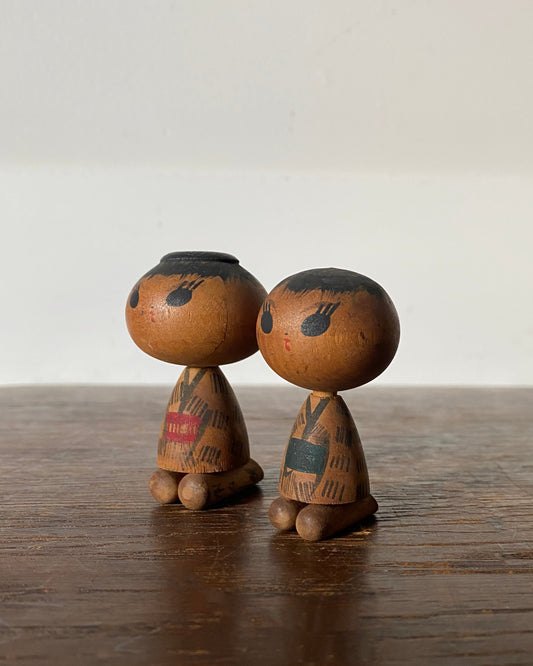 vintage seated kokeshi pair
