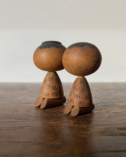 vintage seated kokeshi pair