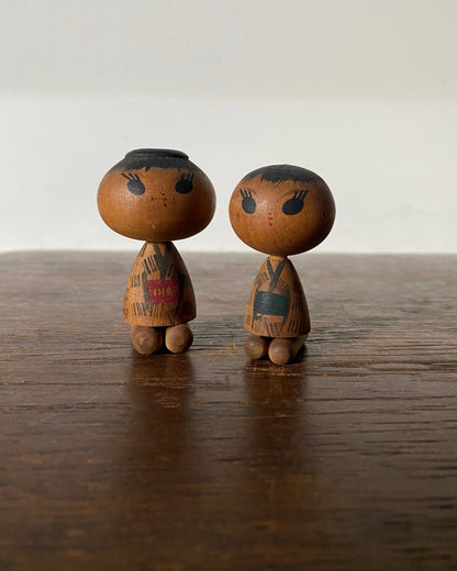 vintage seated kokeshi pair