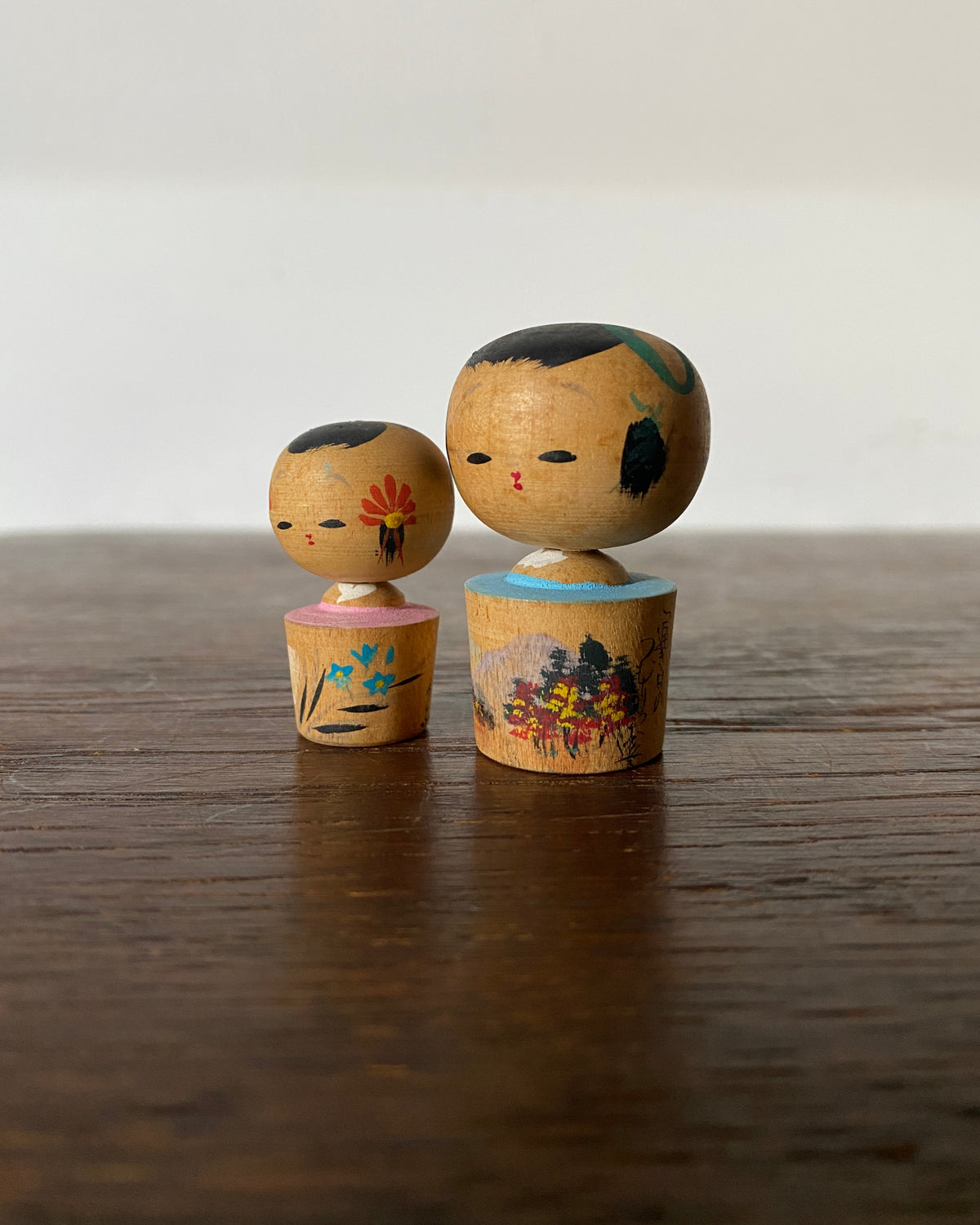 vintage floral souvenir kokeshi pair