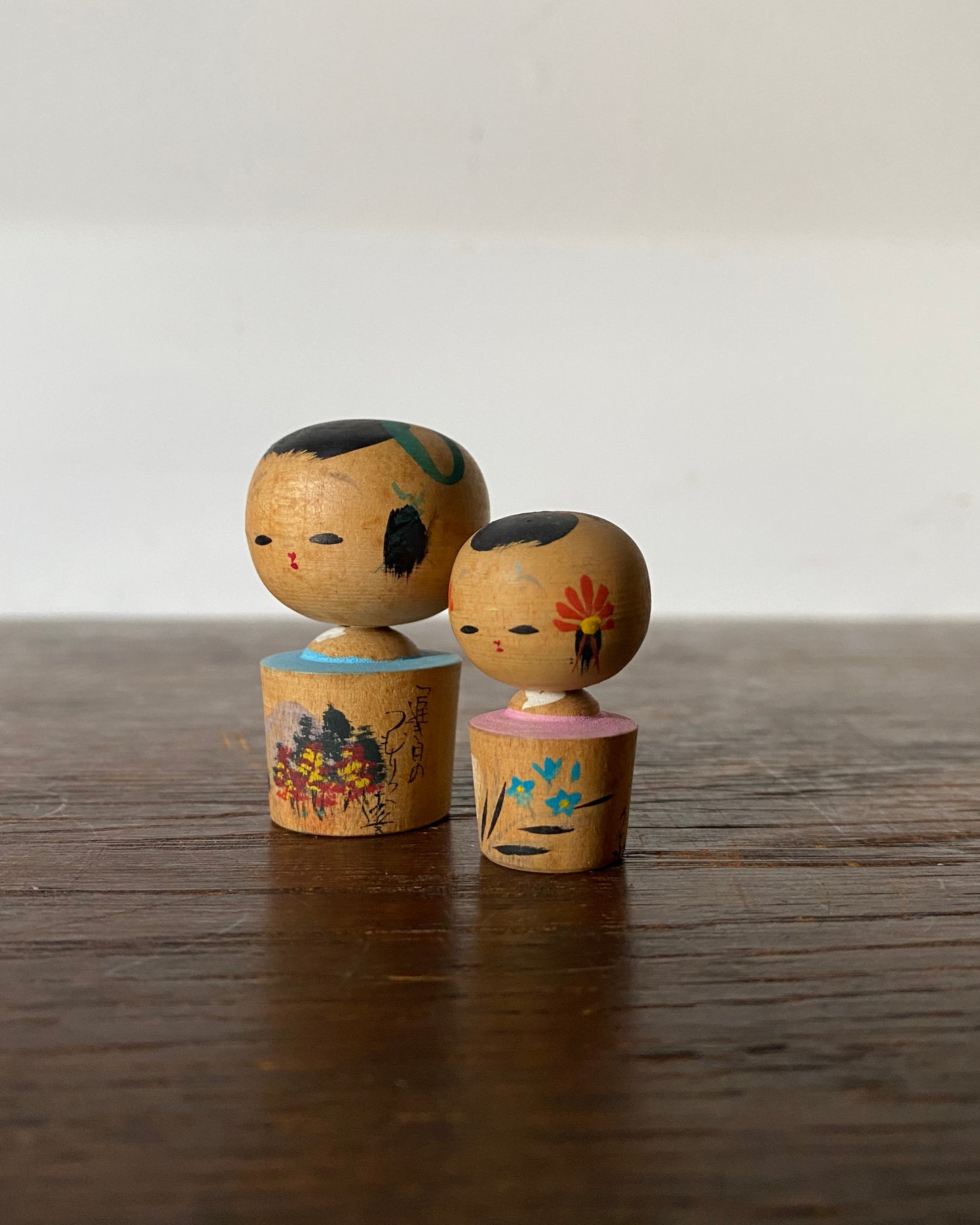 vintage floral souvenir kokeshi pair