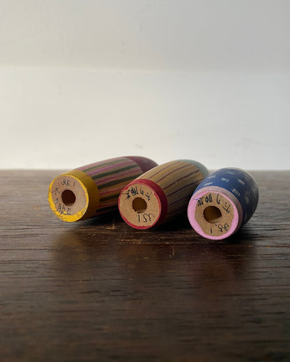 vintage colourful kokeshi trio