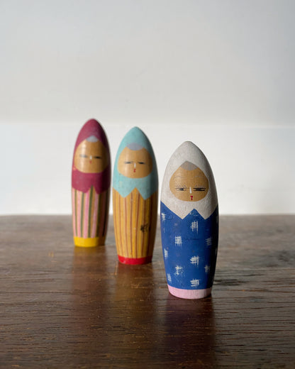 vintage colourful kokeshi trio