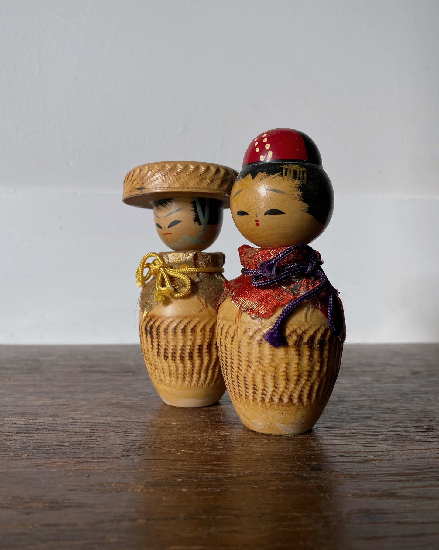 vintage carved traveller kokeshi pair