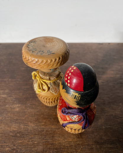 vintage carved traveller kokeshi pair